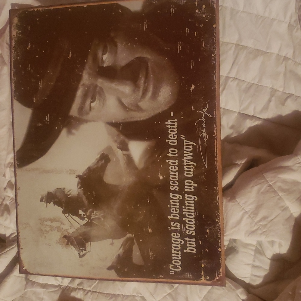 Tin poster of John Wayne